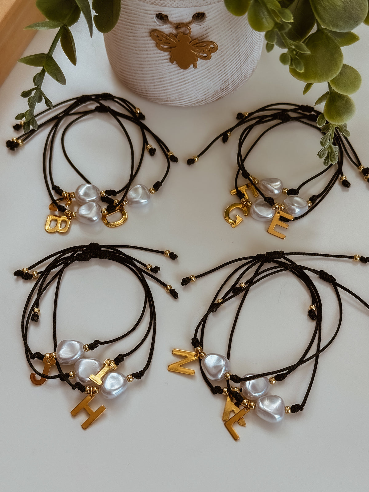 Black bracelet with initial