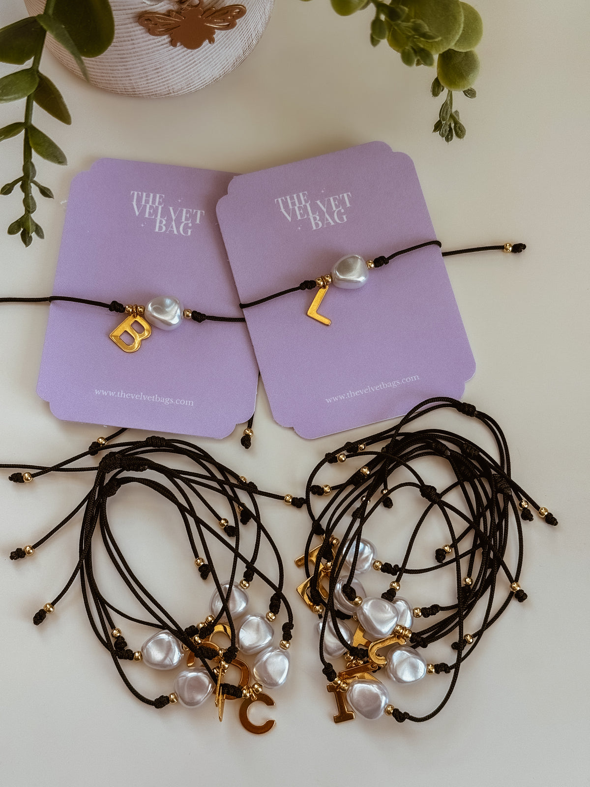 Black bracelet with initial